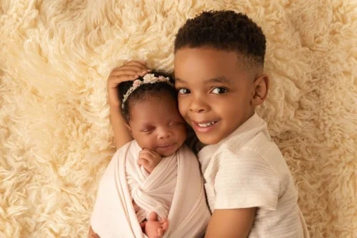 Brother holding Sister