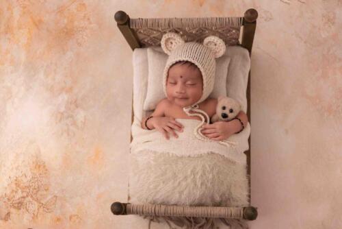 Smiling Bear in Boho Bed